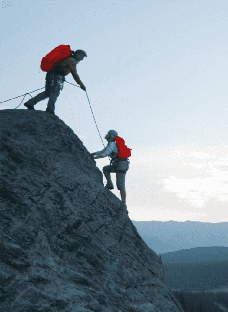 Person with backpack looking at horizon